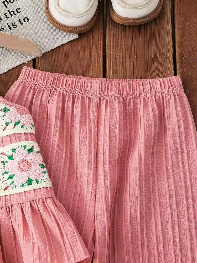 CONJUNTO ROSA DE TEJIDO PEQUEÑO