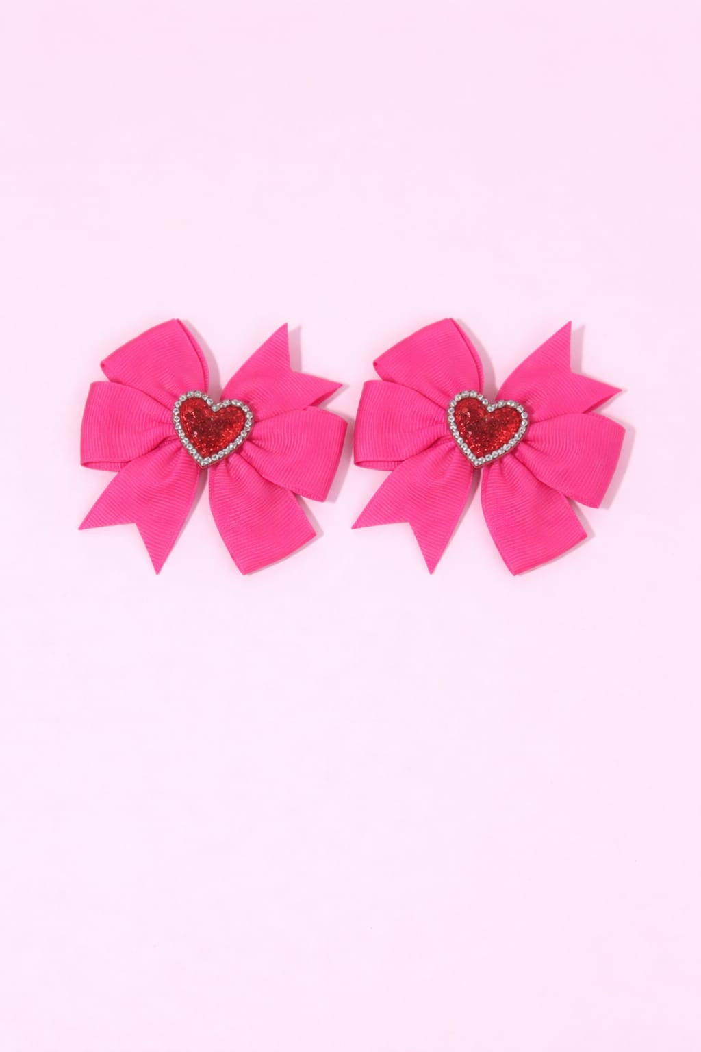 GANCHOS FUCSIA CON CORAZÓN