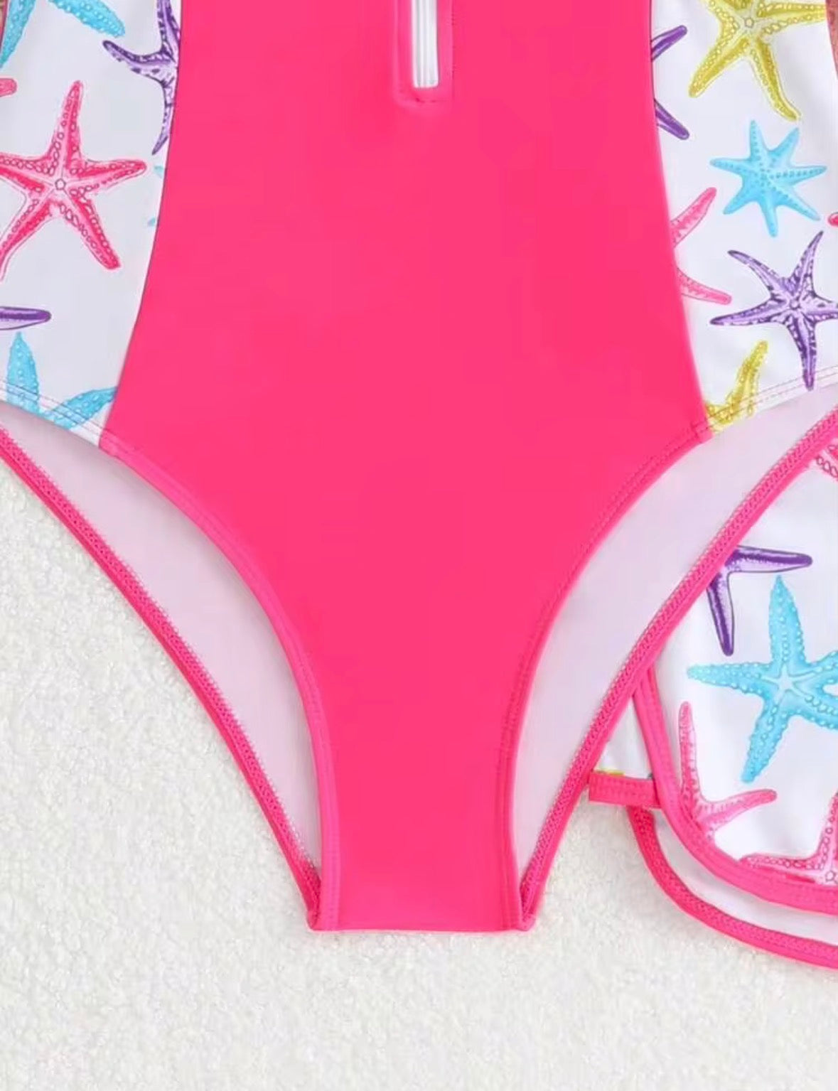 TRAJE DE BAÑO ROSA CON ESTRELLAS DE MAR
