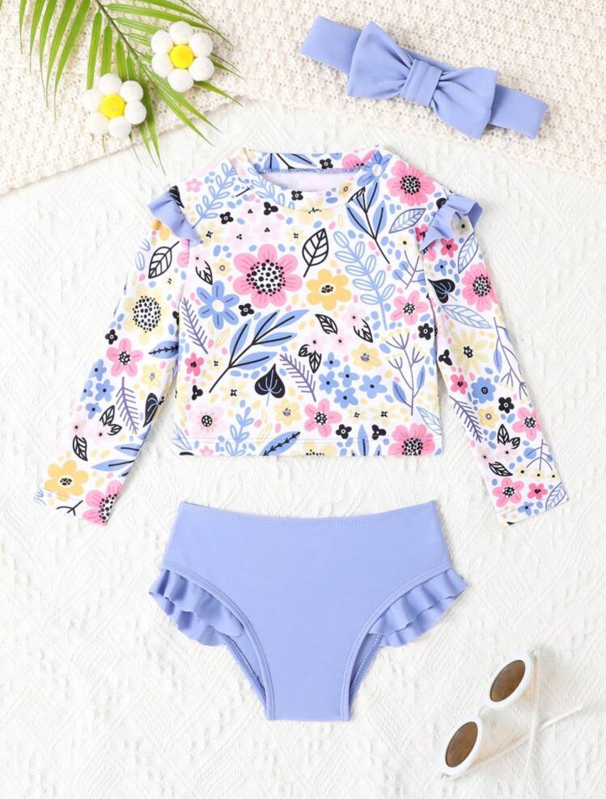 Traje de baño bebe flores morado