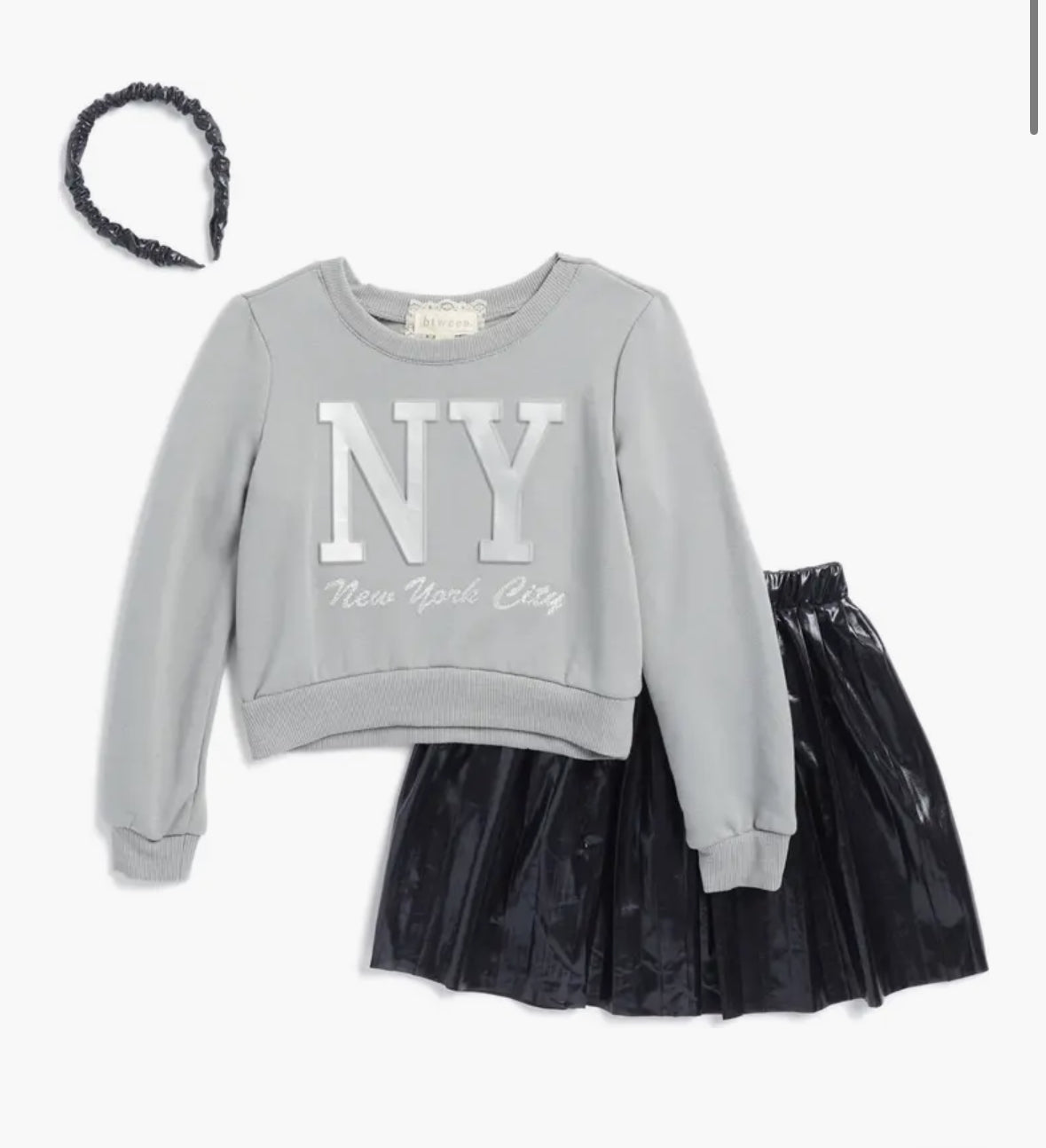 Conjunto suéter y falda cuero gris