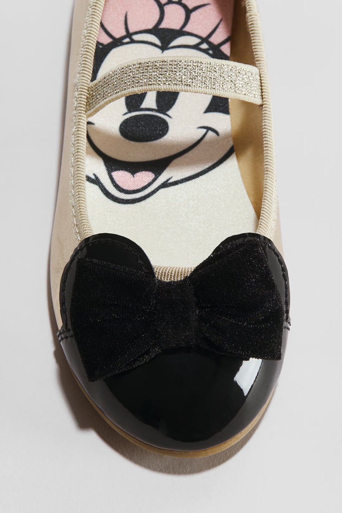 Flats Doradas con negro minnie  h&m
