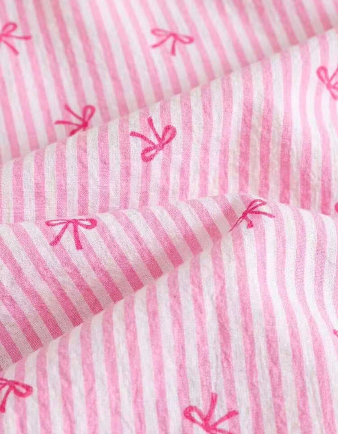 CONJUNTO ROSA CHONGUITOS EN LOS HOMBROS