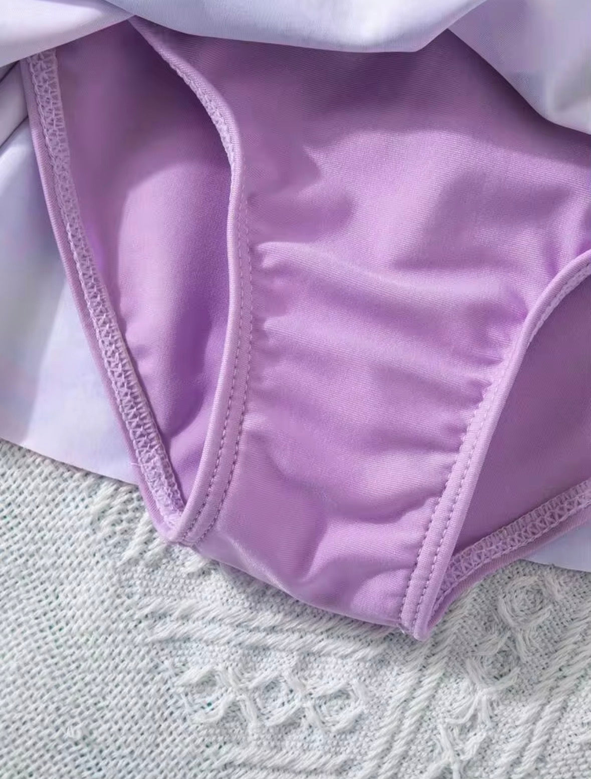 TRAJE DE BAÑO LILA HUNTRIX