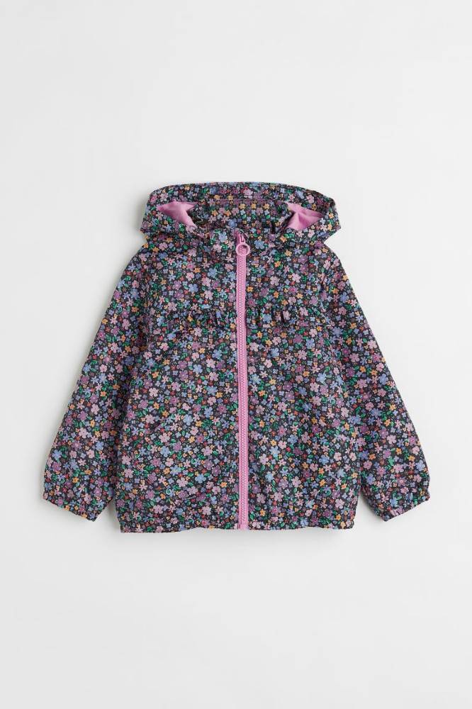 CHUMPA IMPERMEABLE FLOREADA
