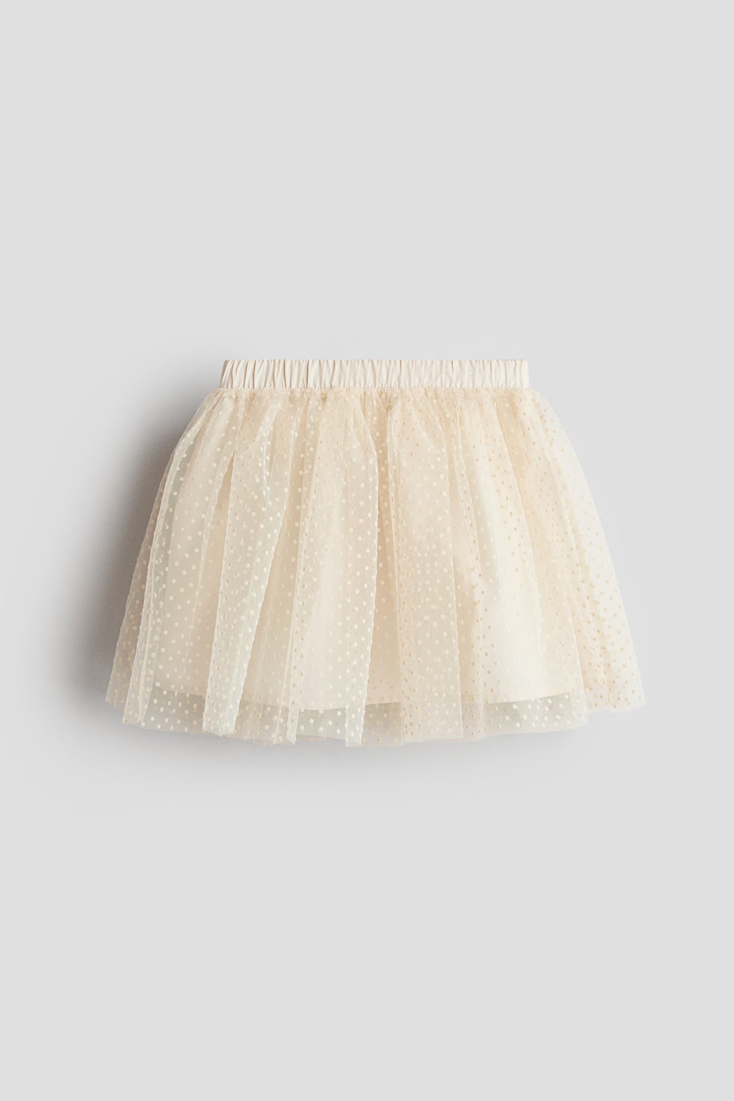 FALDA TUL PUNTITOS BEIGE HM
