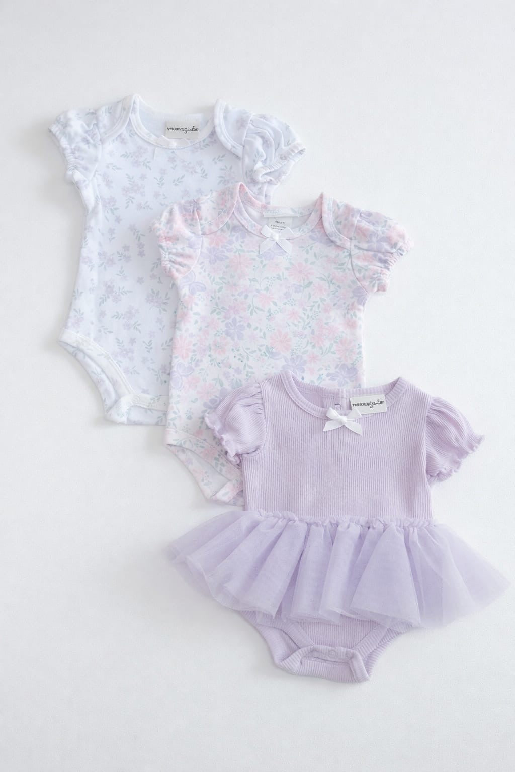 SET DE 3 MAMELUCOS FLOREADOS TUTÚ LILA