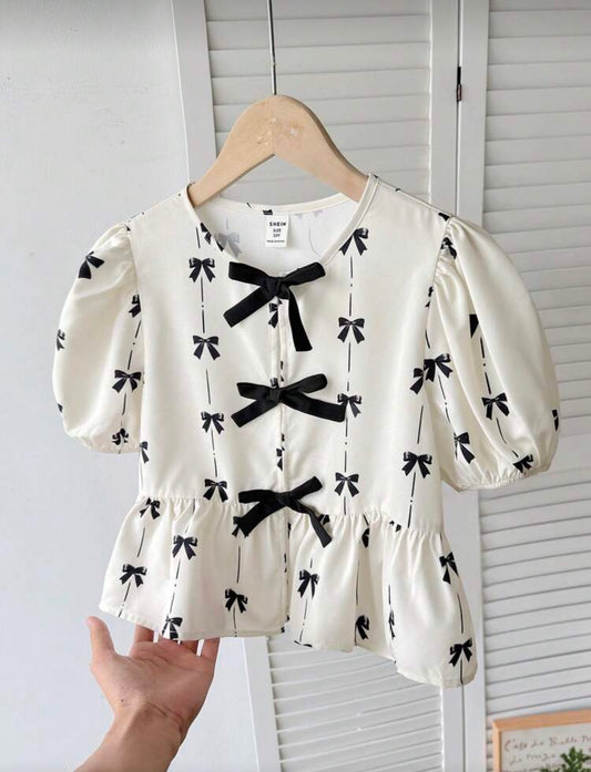 BLUSA BEIGE CHONGUITOS NEGROS