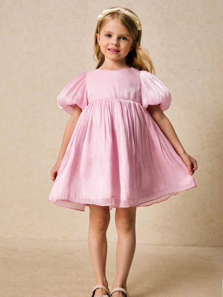 VESTIDO ELEGANTE ROSA CON MOÑO ESPALDA
