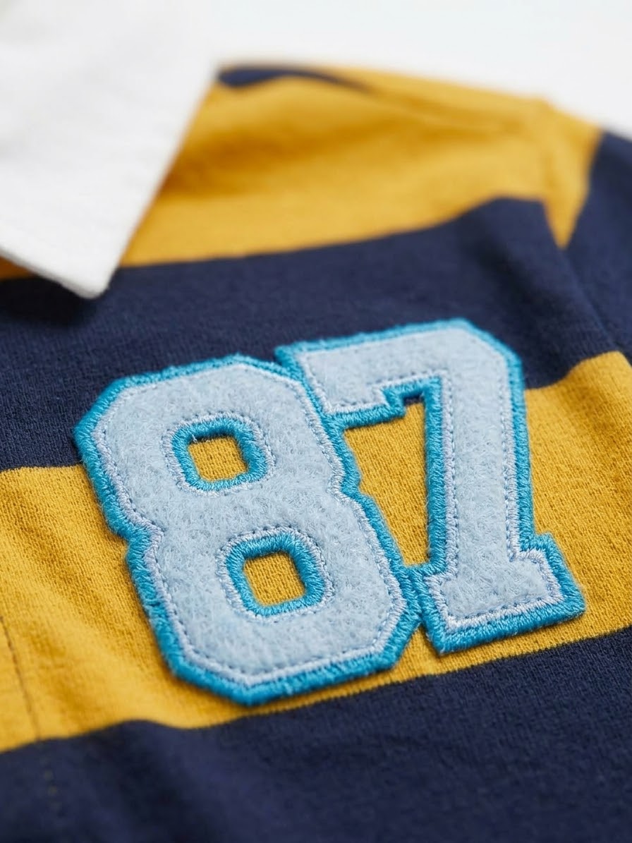 CAMISA POLO RAYADA ‘87’