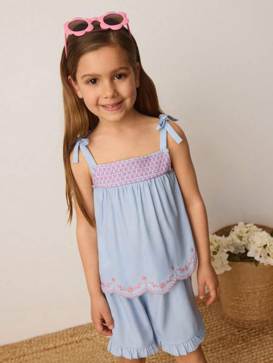 Conjunto azul con bordado rosa