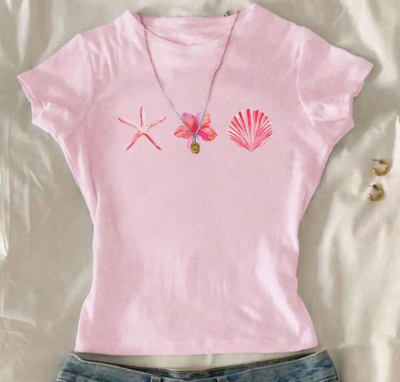 CAMISETAS MAR CONCHITAS Y FLORES