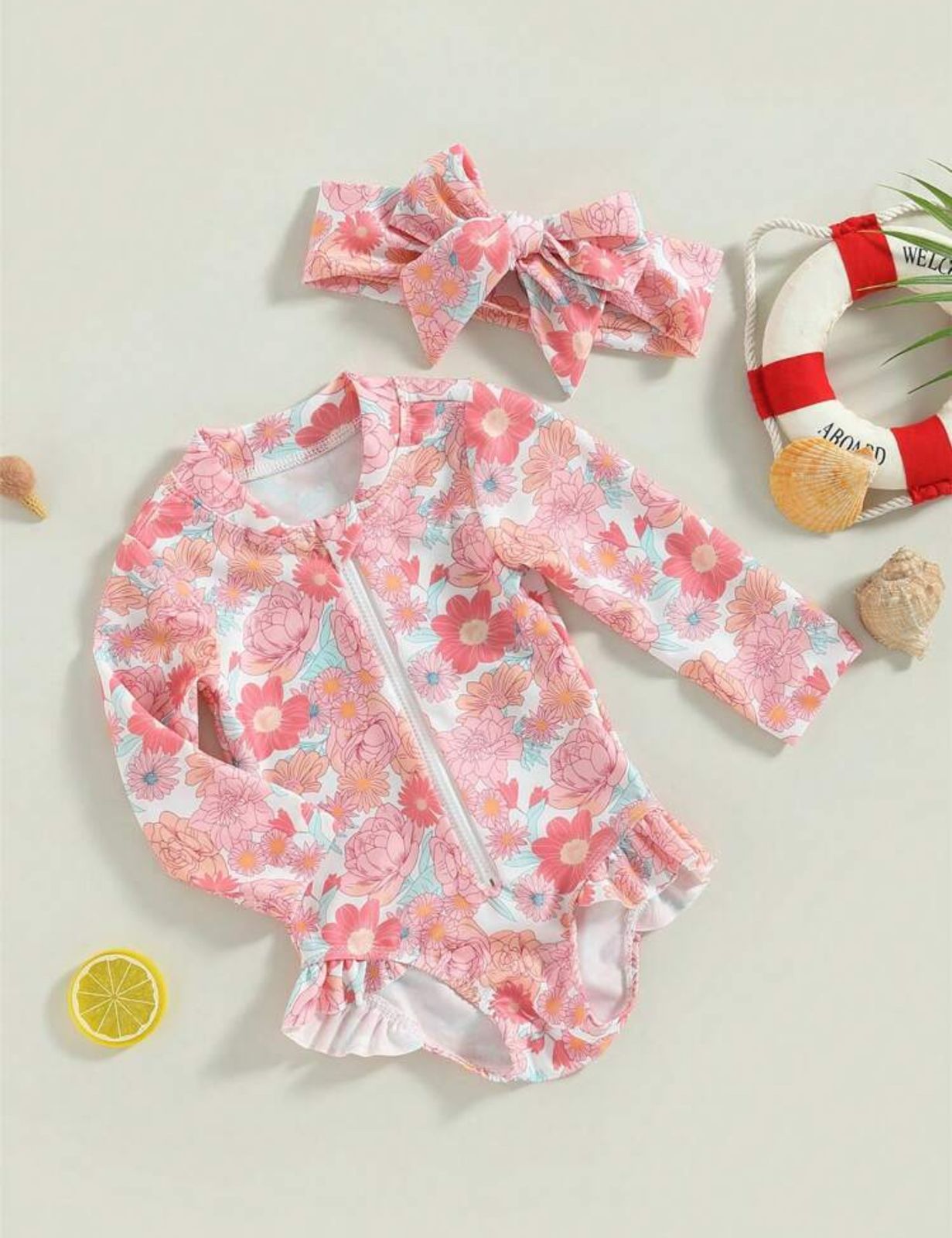 Traje de baño bebe flores vincha rosada